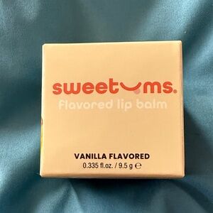 Sweetums Vanilla Lip Balm in Cream Packaging